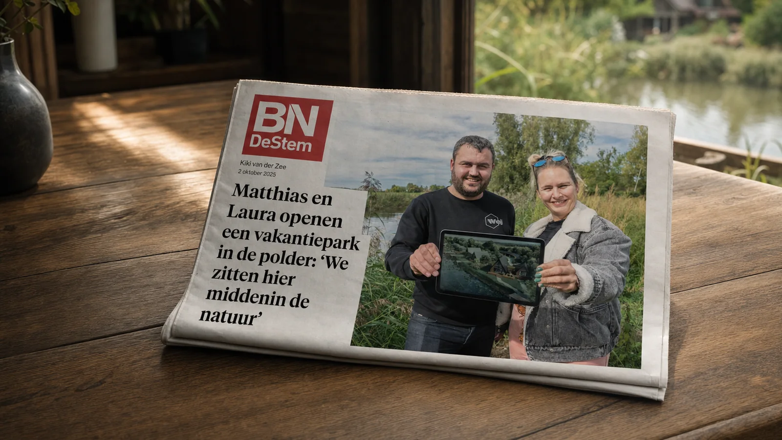 BN DeStem-krant met het artikel over Cruyslandse Kreken op een houten tafel